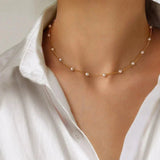 Celestine Gold Pearl Necklace